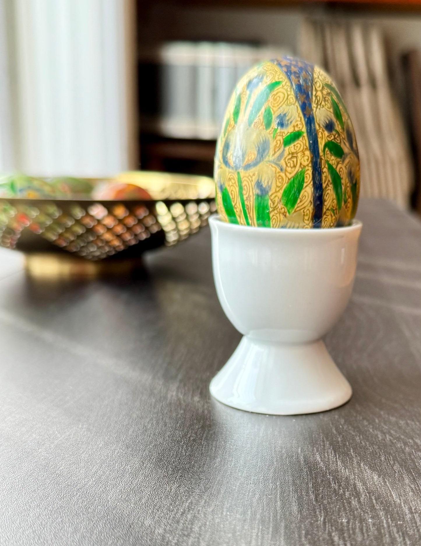Handcrafted Kashmiri papier-mâché Easter eggs, intricately painted with traditional motifs and vibrant colors. A unique blend of heritage and artistry, perfect for adding cultural charm to your festive decor.