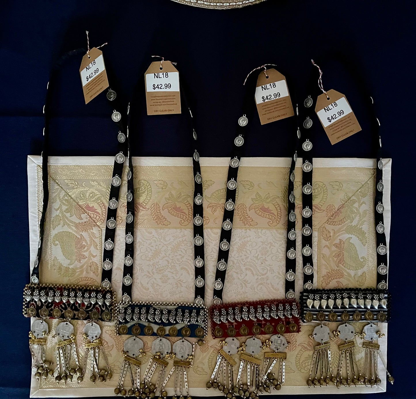 Handcrafted upcycled coin necklaces, featuring unique, vintage coins and intricate detailing, offering a blend of sustainability and timeless style.