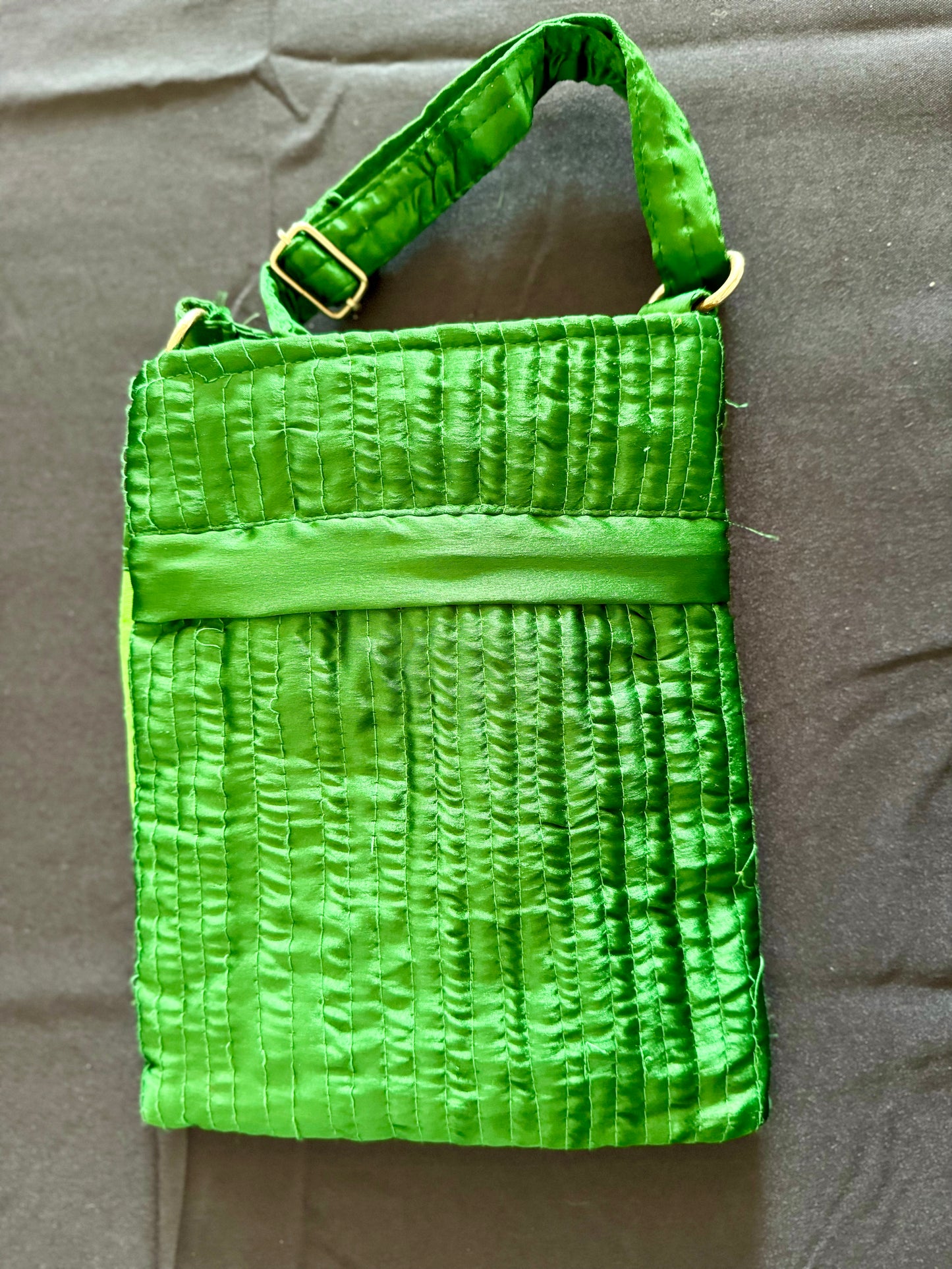 Handcrafted Kutchi embroidery bags and purses featuring intricate needlework, vibrant patterns, and traditional Indian craftsmanship.