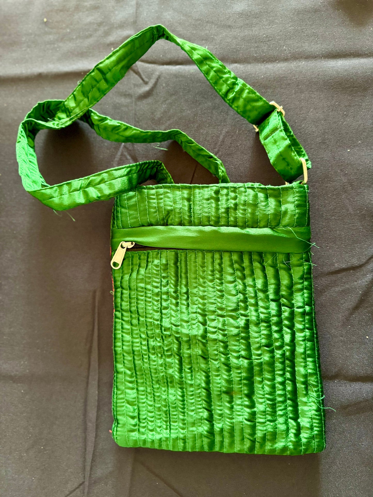 Handcrafted Kutchi embroidery bags and purses featuring intricate needlework, vibrant patterns, and traditional Indian craftsmanship.