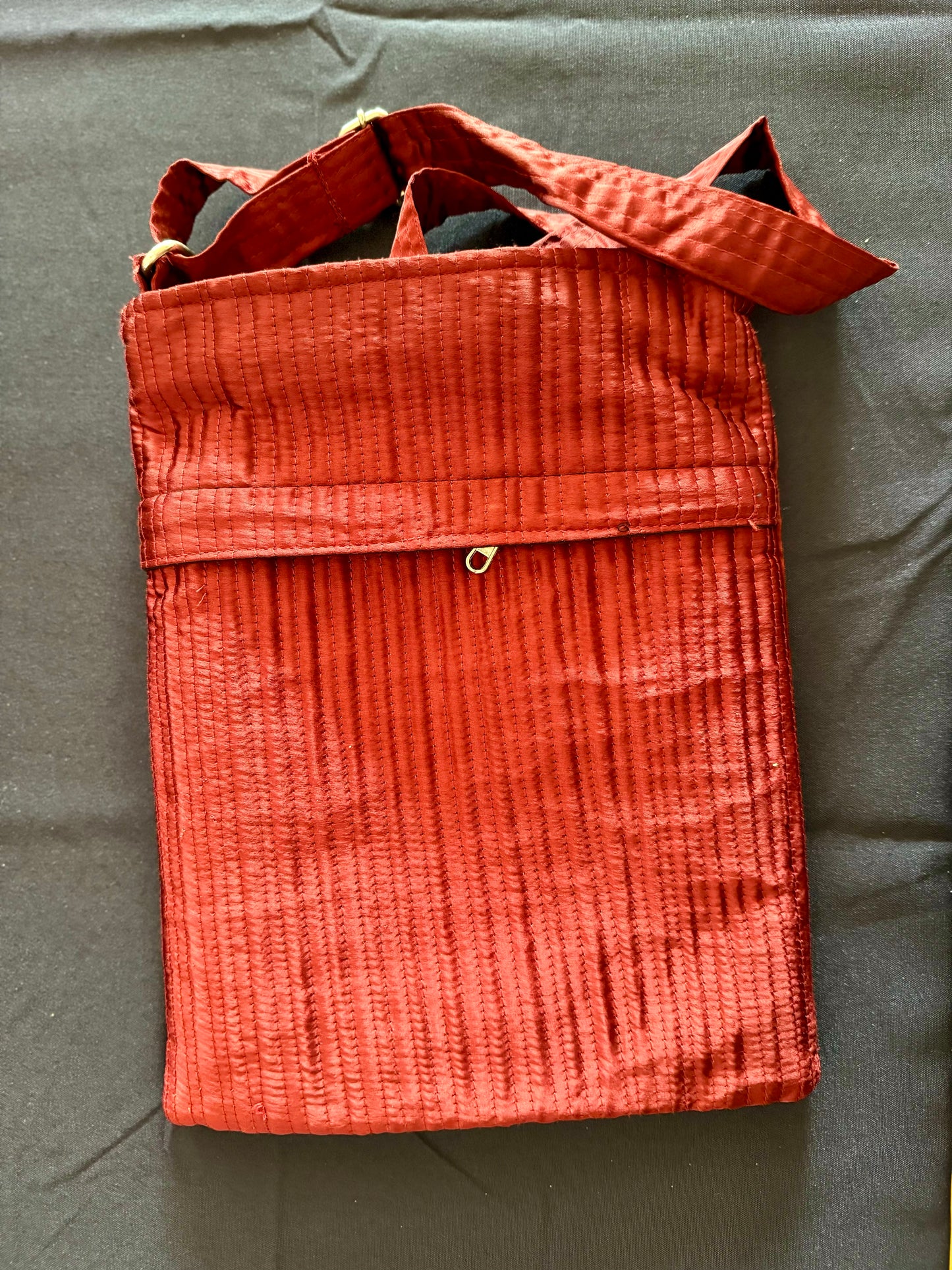 Handcrafted Kutchi embroidery bags and purses featuring intricate needlework, vibrant patterns, and traditional Indian craftsmanship.