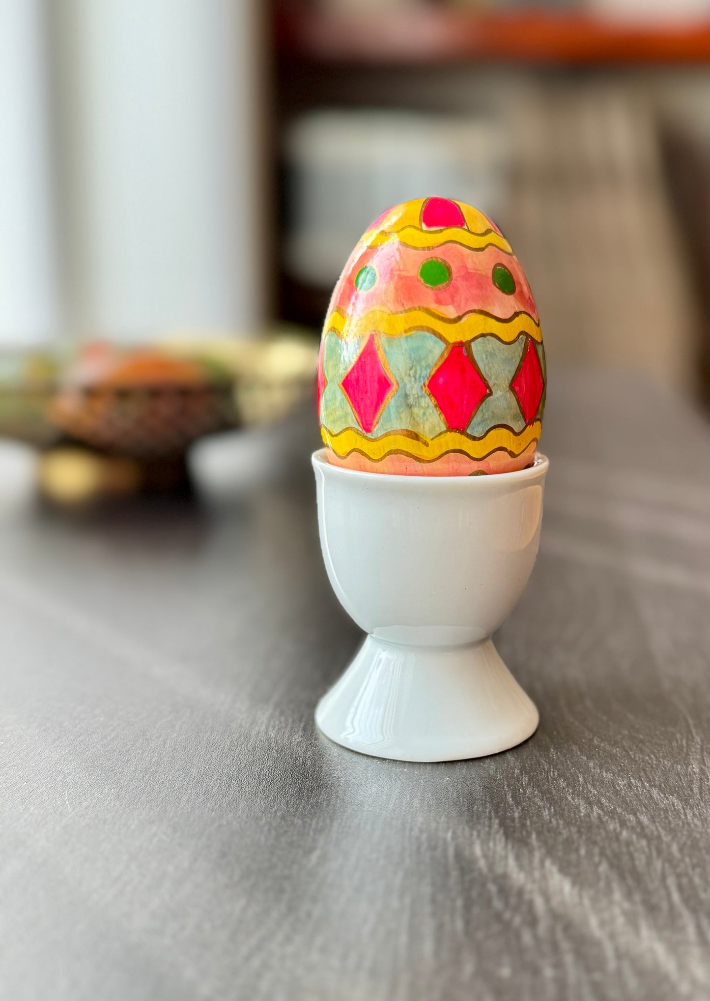 Handcrafted Kashmiri papier-mâché Easter eggs, intricately painted with traditional motifs and vibrant colors. A unique blend of heritage and artistry, perfect for adding cultural charm to your festive decor.