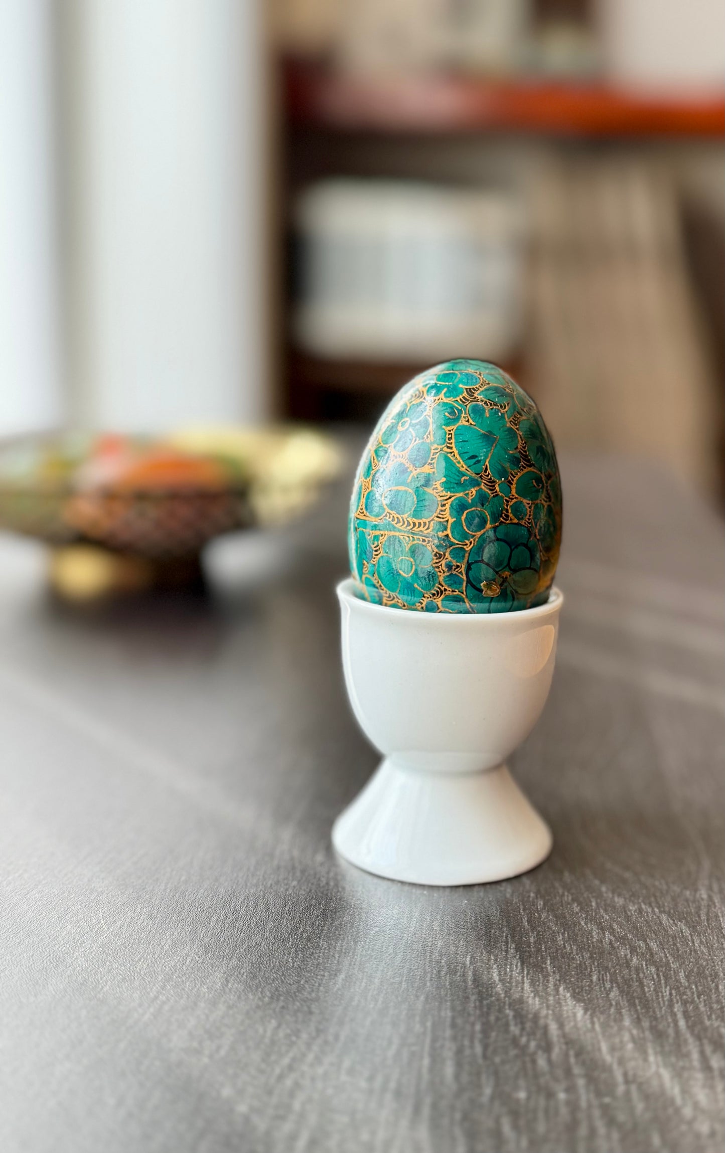 Handcrafted Kashmiri papier-mâché Easter eggs, intricately painted with traditional motifs and vibrant colors. A unique blend of heritage and artistry, perfect for adding cultural charm to your festive decor.