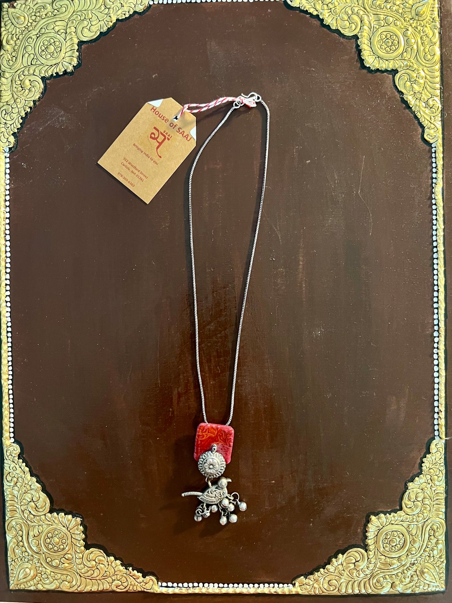 Eco-friendly upcycled handmade small-sized pendant necklaces, featuring delicate designs and sustainable materials, offering a subtle and stylish accessory.