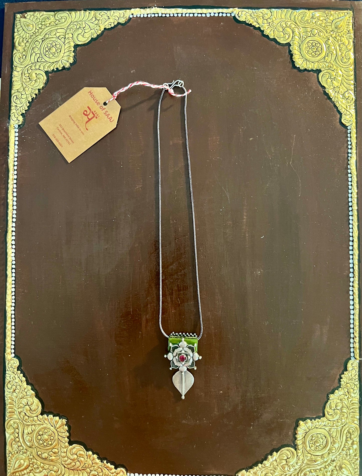 Eco-friendly upcycled handmade small-sized pendant necklaces, featuring delicate designs and sustainable materials, offering a subtle and stylish accessory.