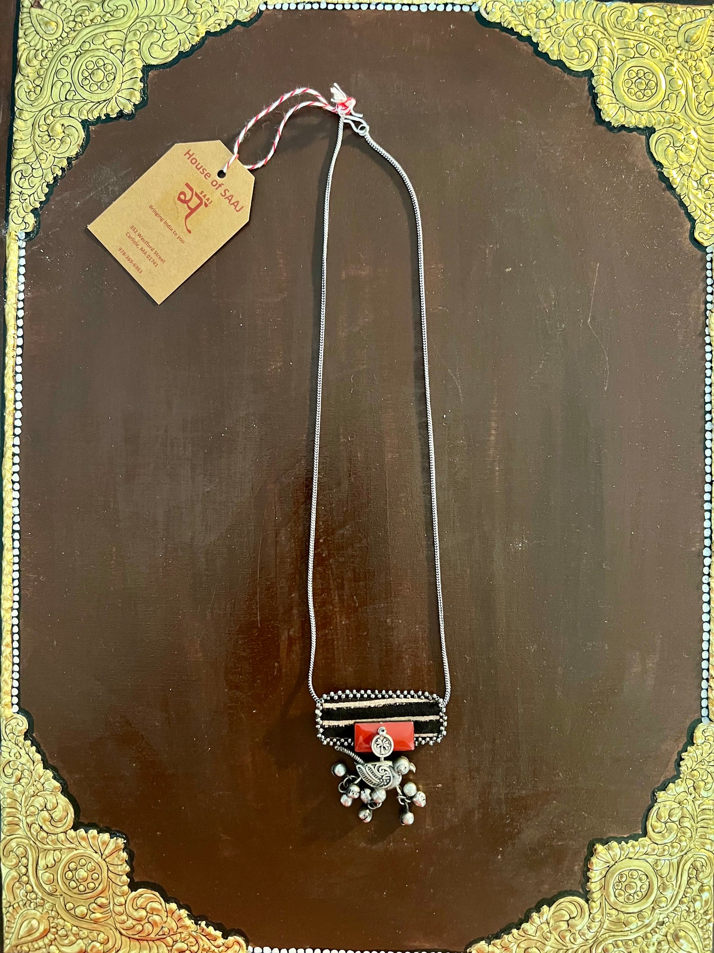 Eco-friendly upcycled handmade small-sized pendant necklaces, featuring delicate designs and sustainable materials, offering a subtle and stylish accessory.