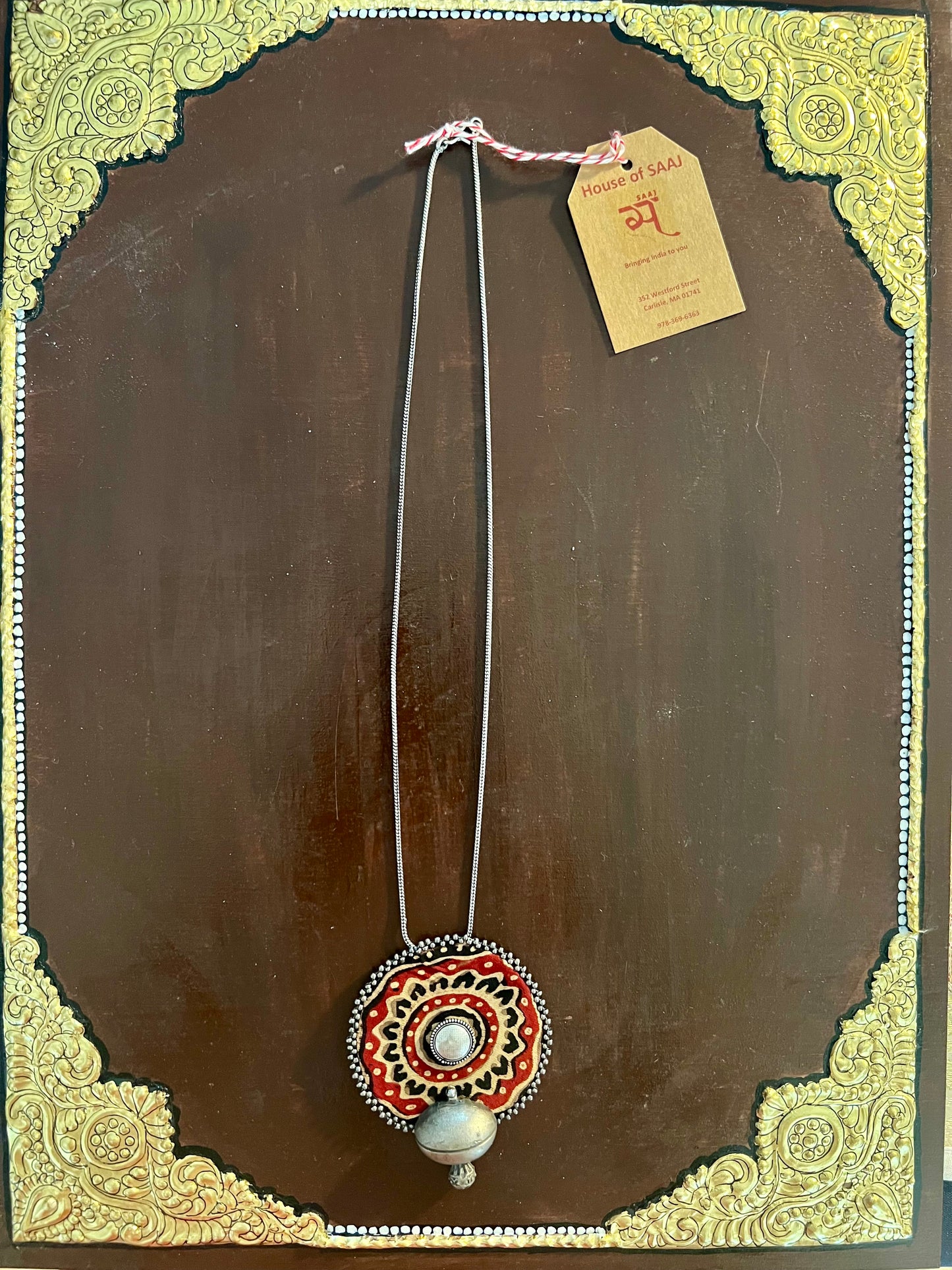 Eco-friendly upcycled handmade small-sized pendant necklaces, featuring delicate designs and sustainable materials, offering a subtle and stylish accessory.