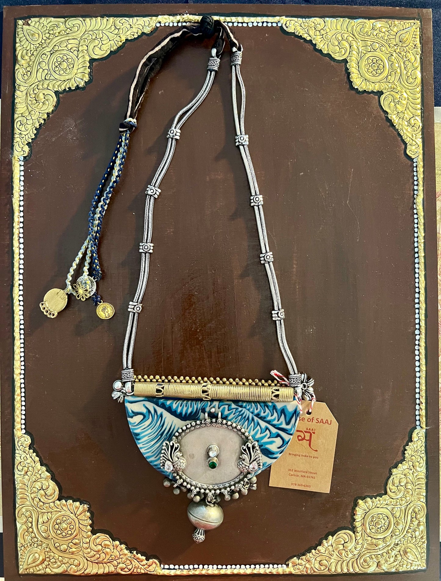 Eco-friendly upcycled handmade large pendant necklaces, featuring bold designs and unique materials, combining sustainability with striking craftsmanship.