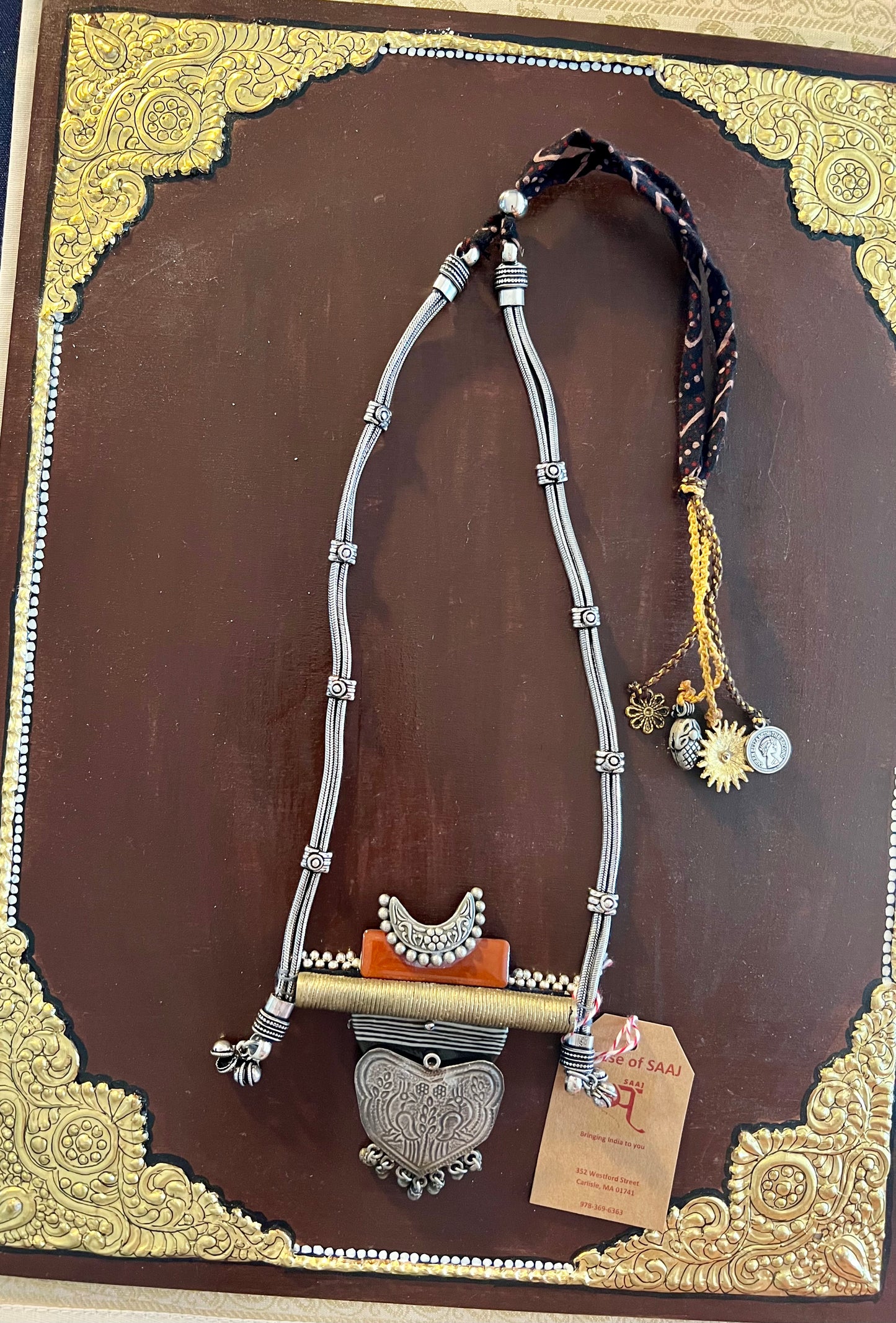 Eco-friendly upcycled handmade large pendant necklaces, featuring bold designs and unique materials, combining sustainability with striking craftsmanship.