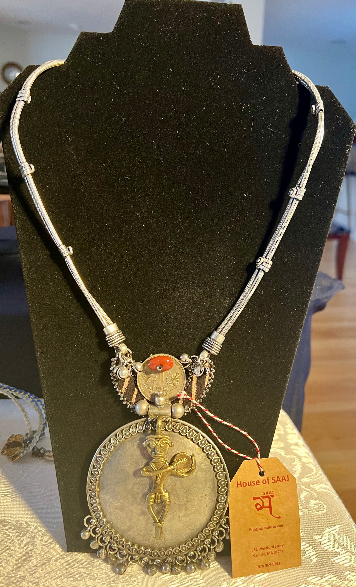 Eco-friendly upcycled handmade large pendant necklaces, featuring bold designs and unique materials, combining sustainability with striking craftsmanship.