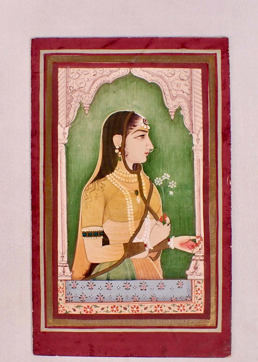 Exquisite Vintage Bani Thani painting, featuring the iconic Rajasthani miniature art style with delicate brushwork and rich colors. A timeless piece reflecting elegance, grace, and heritage.
