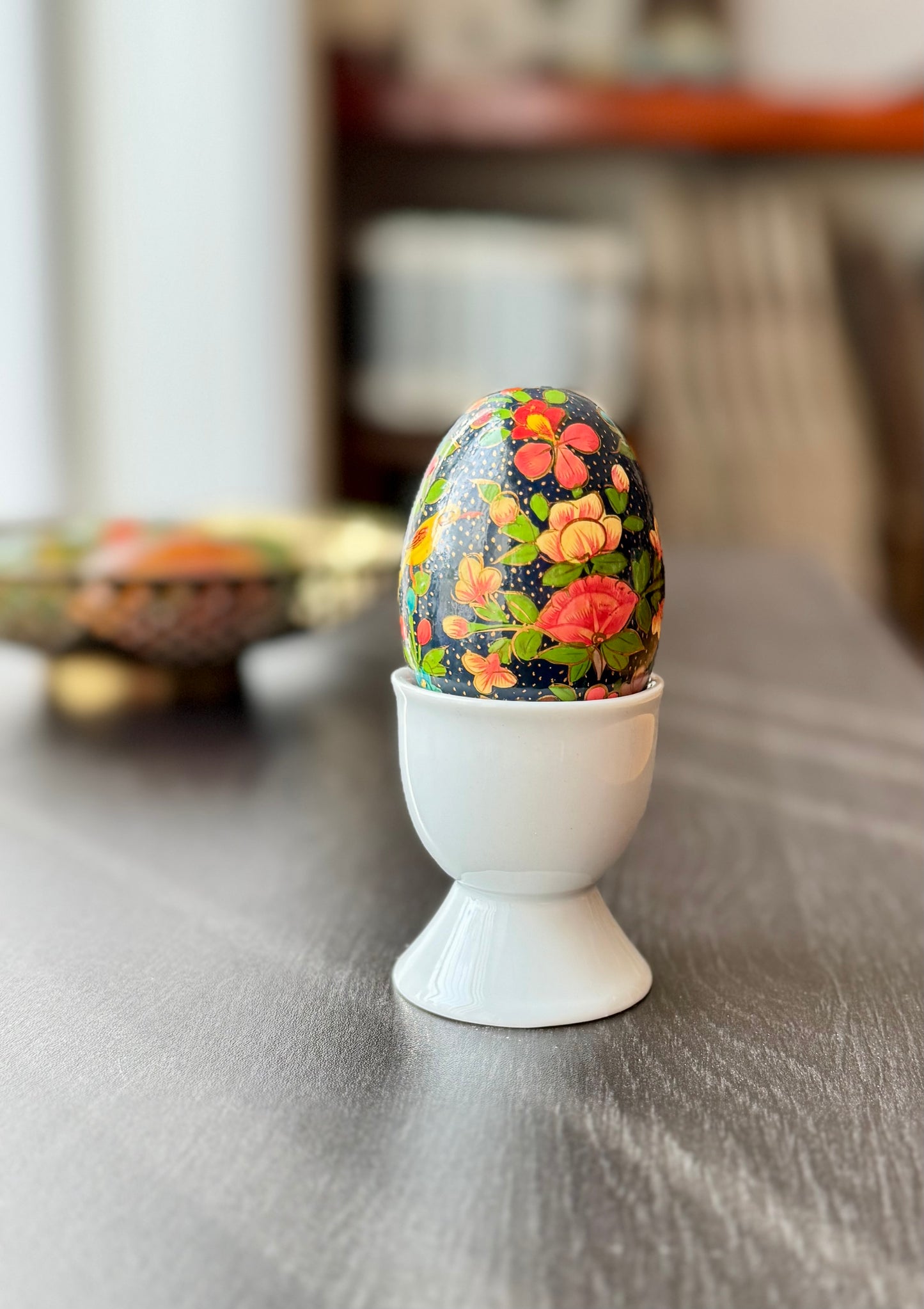 Handcrafted Kashmiri papier-mâché Easter eggs, intricately painted with traditional motifs and vibrant colors. A unique blend of heritage and artistry, perfect for adding cultural charm to your festive decor.