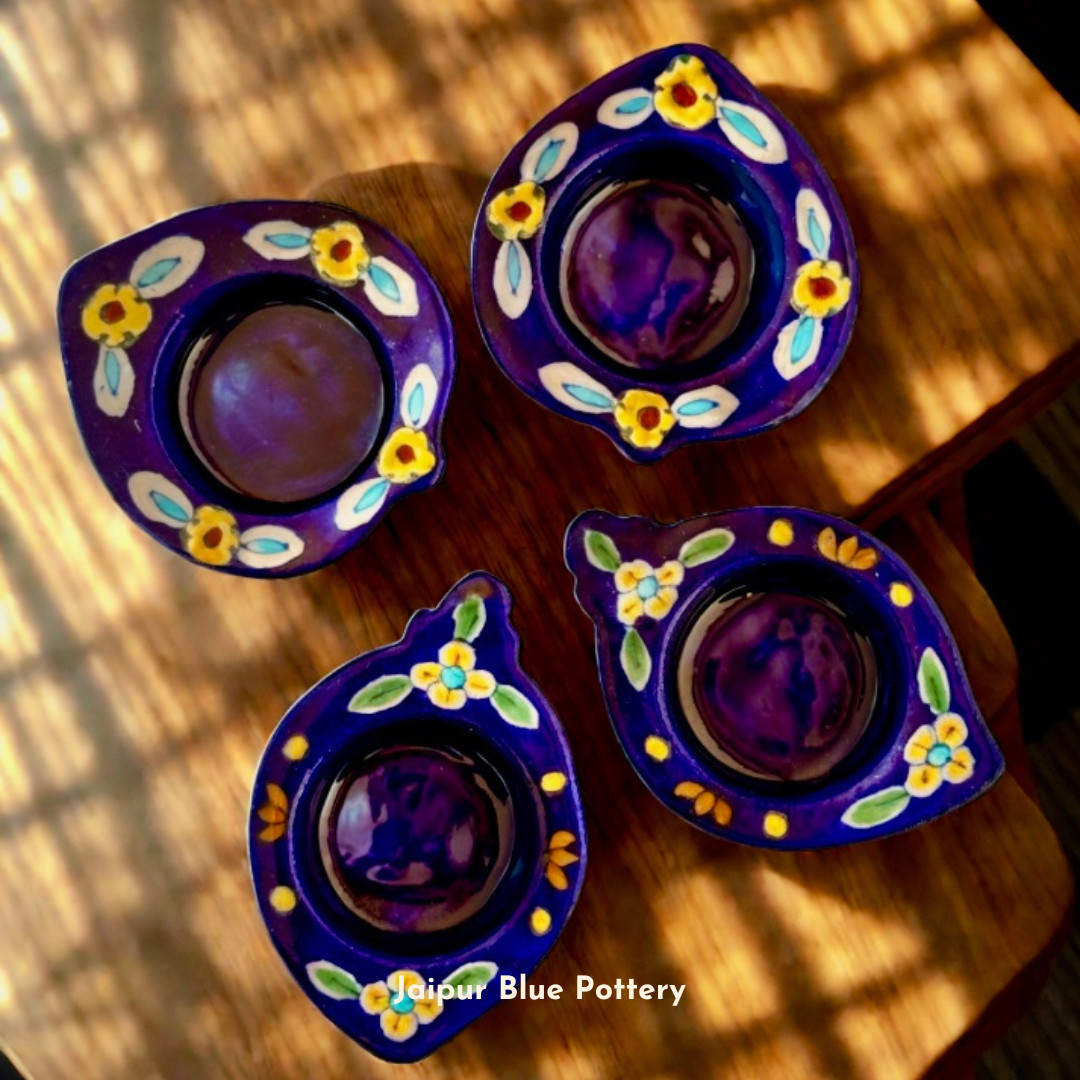 Elegant Jaipur Blue Pottery collection, featuring hand-painted designs with intricate patterns and vibrant blue hues. A perfect blend of traditional craftsmanship and artistic elegance to enhance your home decor.