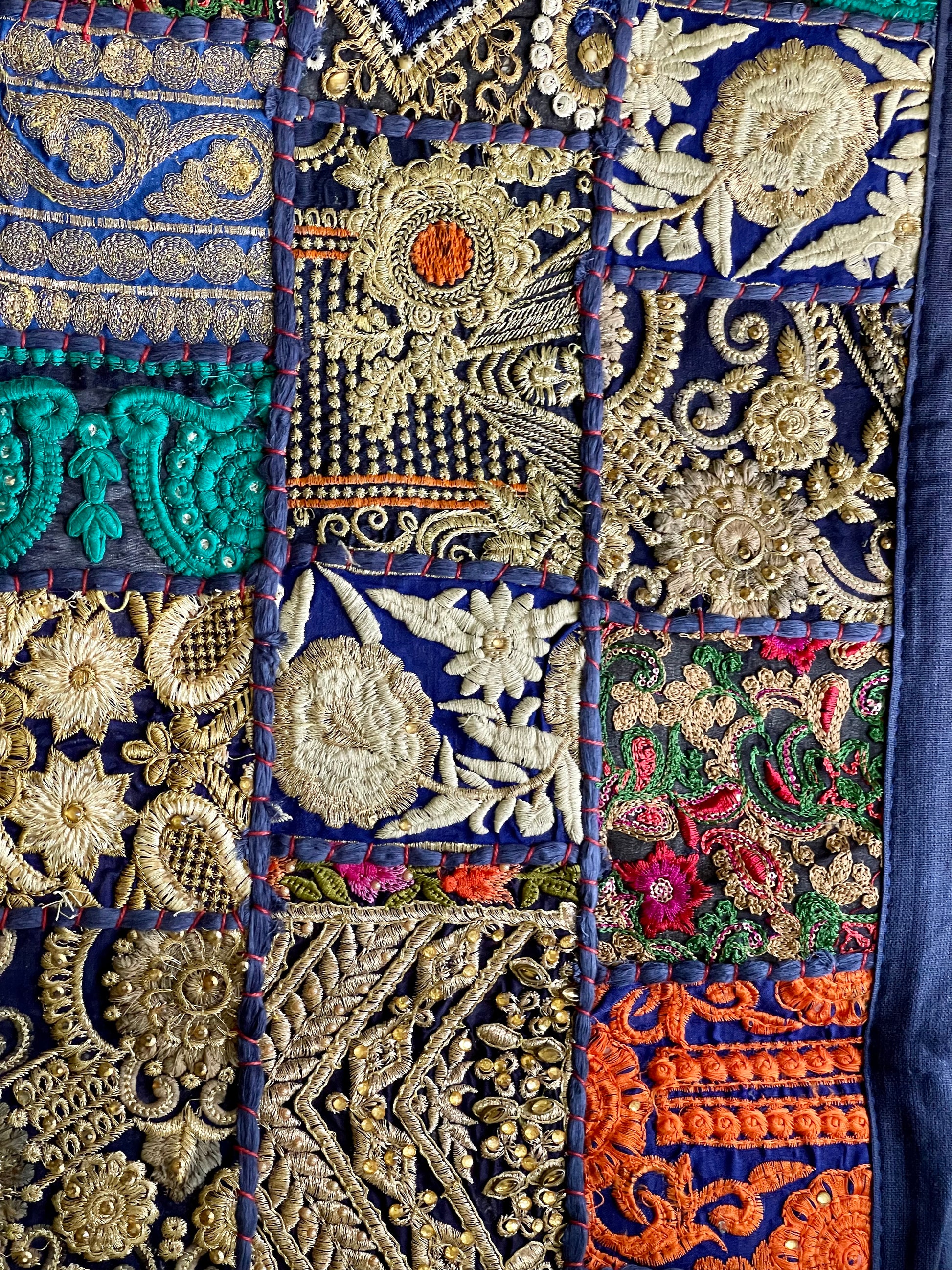 Handcrafted Kutchi Khambhadia work table runner, featuring vibrant patchwork and detailed embroidery, bringing a blend of traditional Indian artistry to your dining table.