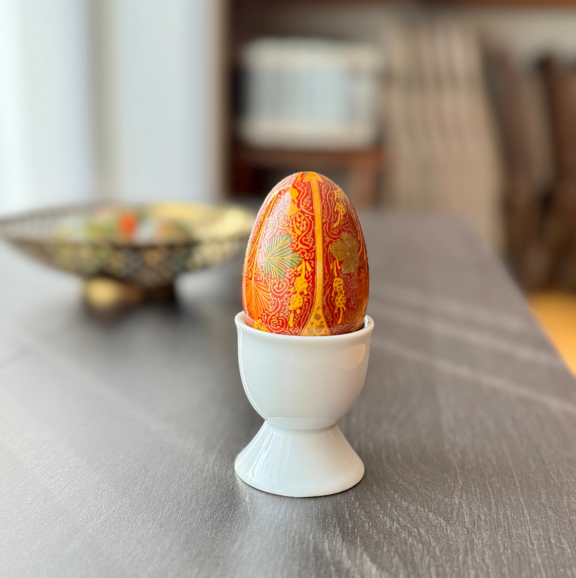 Handcrafted Kashmiri papier-mâché Easter eggs, intricately painted with traditional motifs and vibrant colors. A unique blend of heritage and artistry, perfect for adding cultural charm to your festive decor.