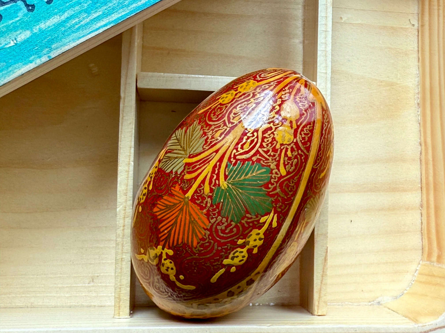 Handcrafted Kashmiri papier-mâché Easter eggs, intricately painted with traditional motifs and vibrant colors. A unique blend of heritage and artistry, perfect for adding cultural charm to your festive decor.