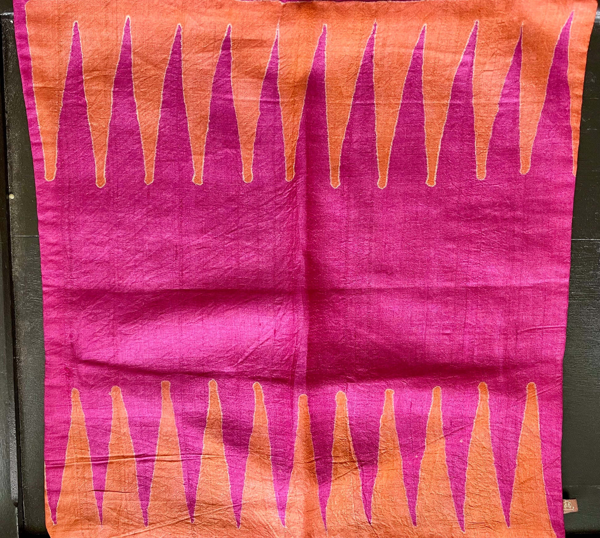 Elegant raw silk hand block print cushion covers, featuring intricate patterns and rich colors, combining traditional craftsmanship with luxurious texture.