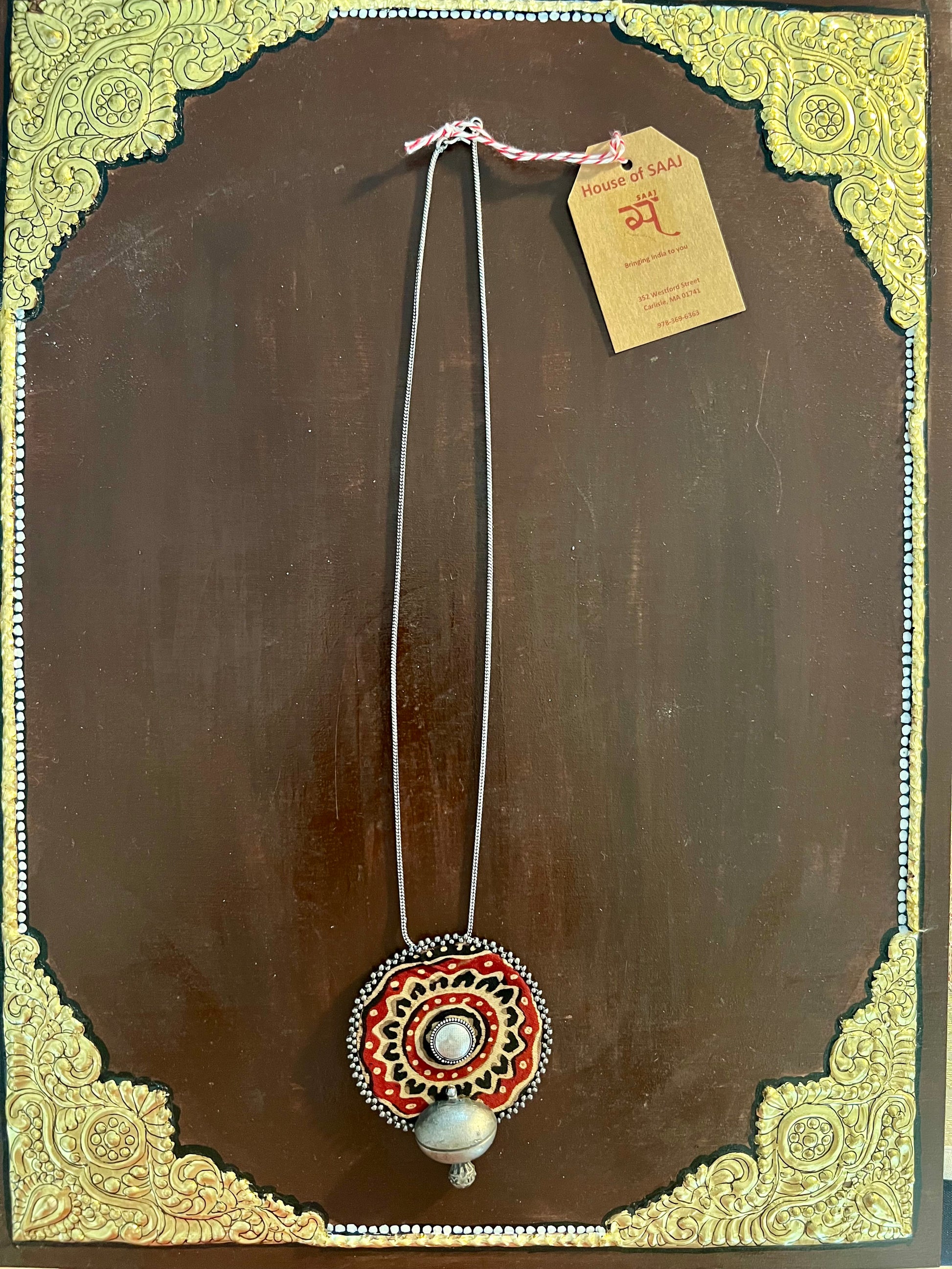 Eco-friendly upcycled handmade small-sized pendant necklaces, featuring delicate designs and sustainable materials, offering a subtle and stylish accessory.
