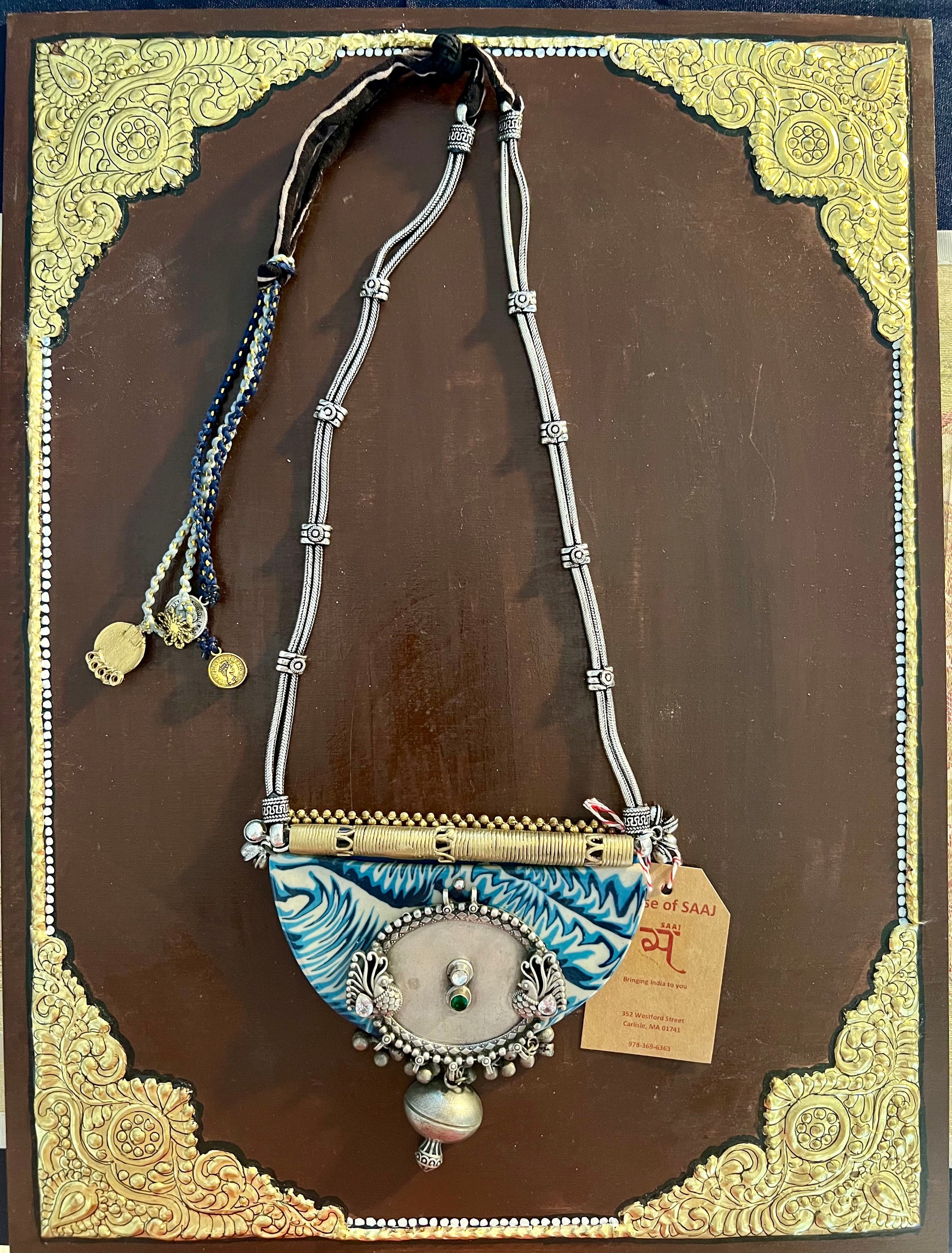 Eco-friendly upcycled handmade large pendant necklaces, featuring bold designs and unique materials, combining sustainability with striking craftsmanship.