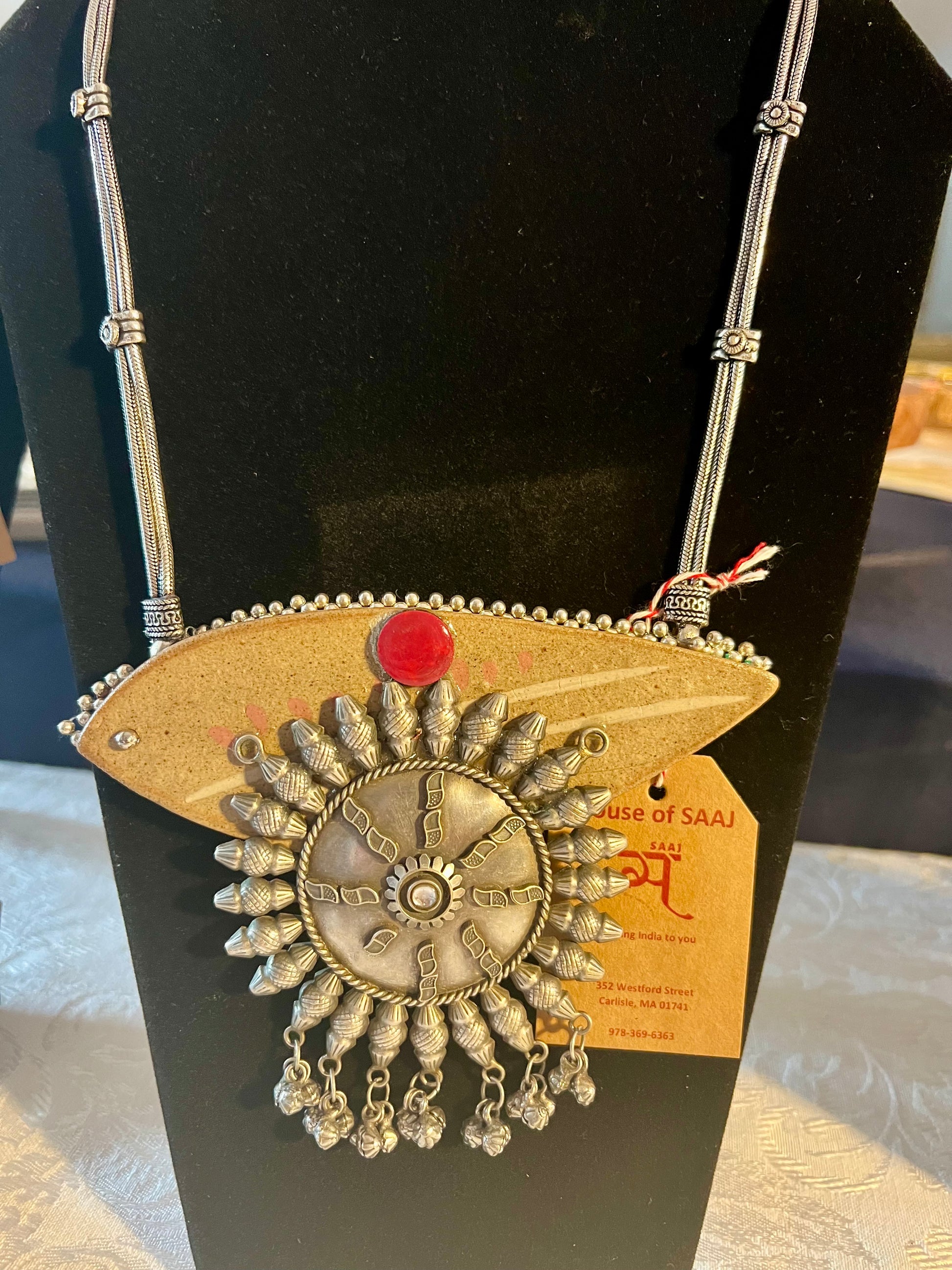 Eco-friendly upcycled handmade large pendant necklaces, featuring bold designs and unique materials, combining sustainability with striking craftsmanship.